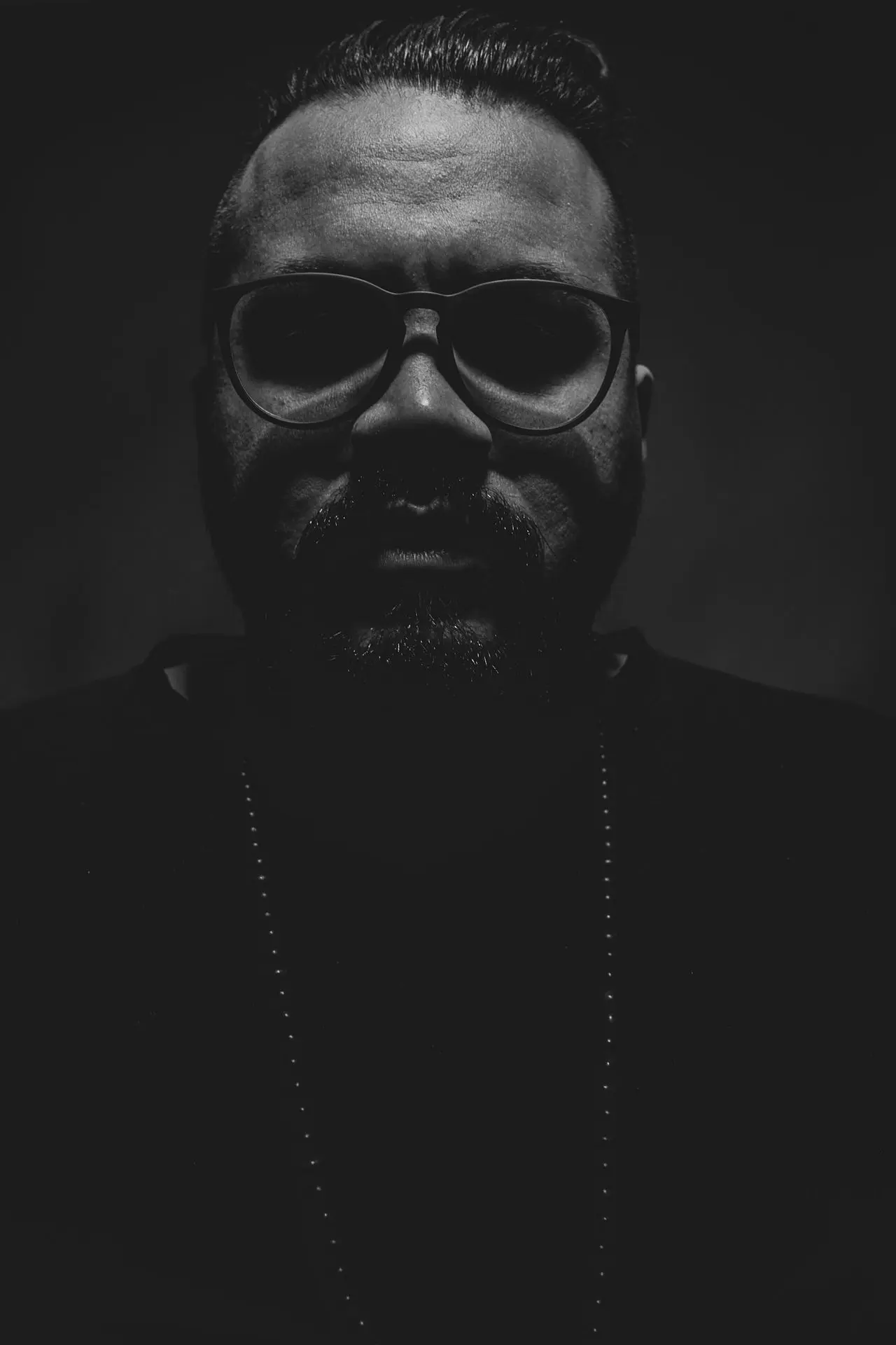 man wearing black framed eyeglasses